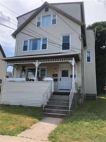 a view of a house with a balcony