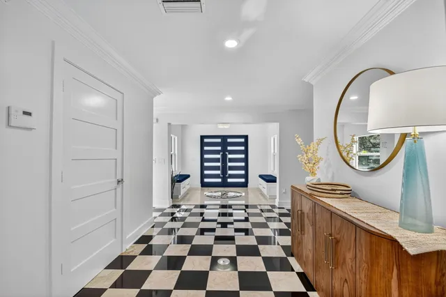 a view of a entryway with wooden floor