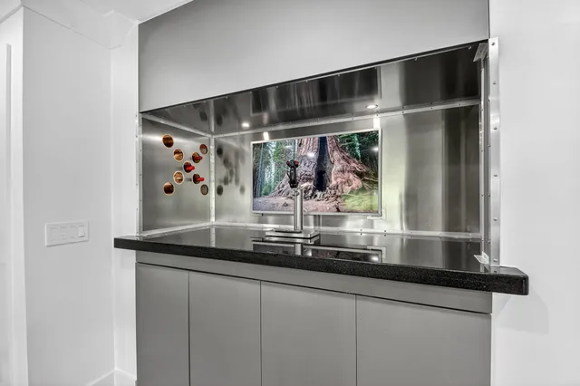 a close view of sink and mirror