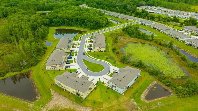 a view of a swimming pool with a garden