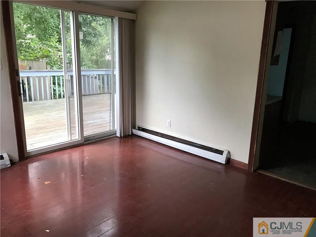 403 Matawan Road Old Bridge, NJ 08879 - Photo 11 of 11 a view of room with floor to ceiling window