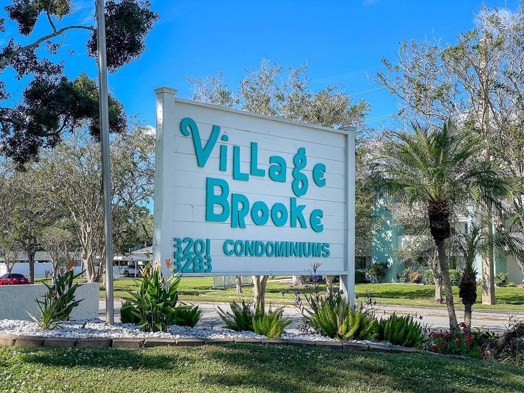 3251 South Beneva Road, Unit 101 Sarasota, FL 34232 - Photo 22 of 22 a view of a sign board with a big yard