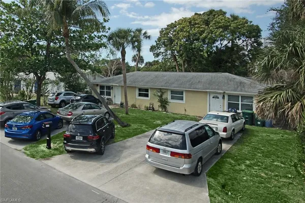 a car parked in front of a house