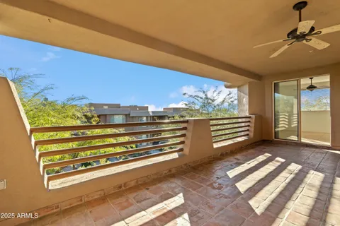 a view of outdoor space with the floor to ceiling windows