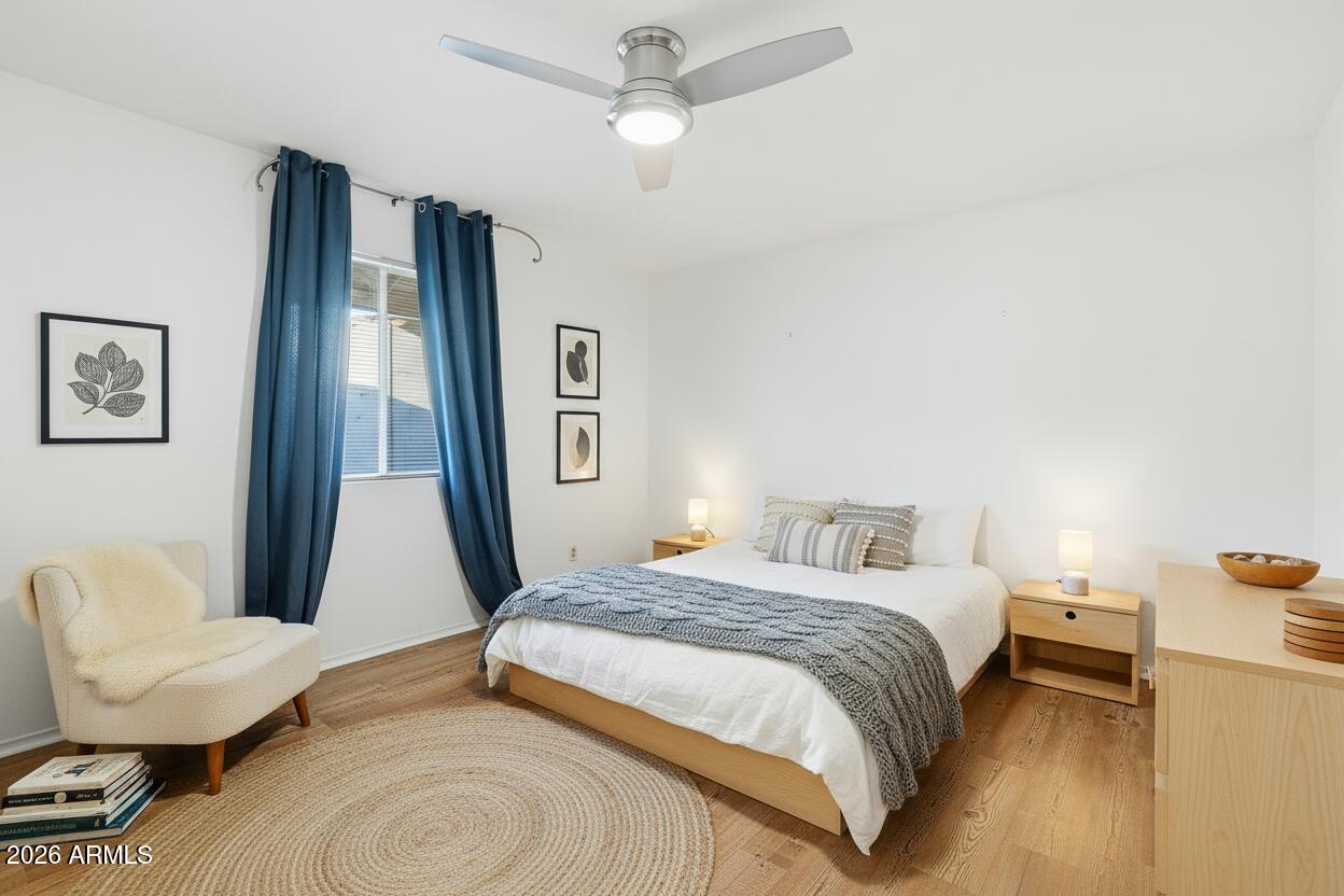 3830 East Shangri La Road Phoenix, AZ 85028 - Photo 26 of 53 a bedroom with a bed couch and a window