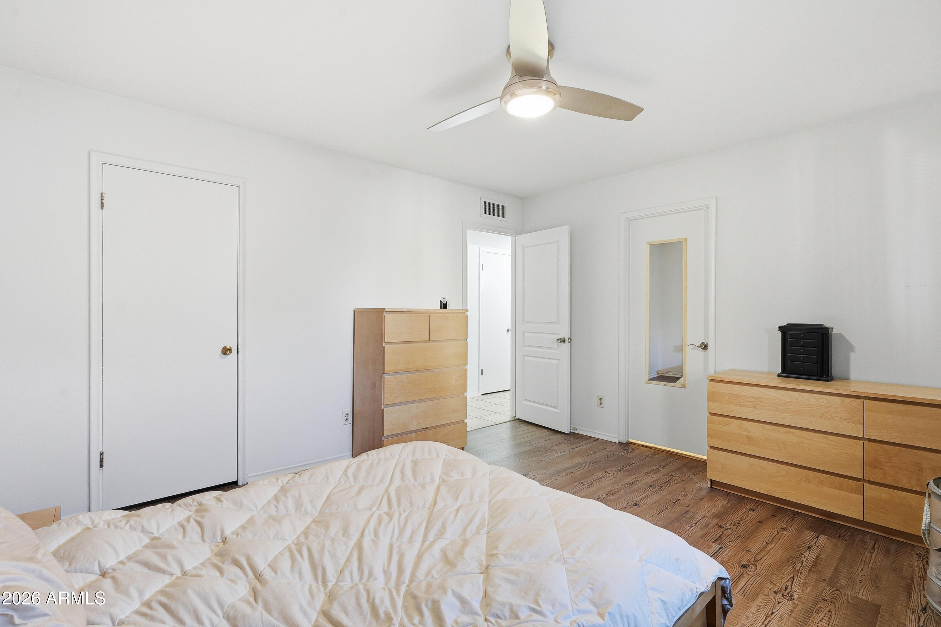 3830 East Shangri La Road Phoenix, AZ 85028 - Photo 27 of 53 a bedroom with a bed and a dresser