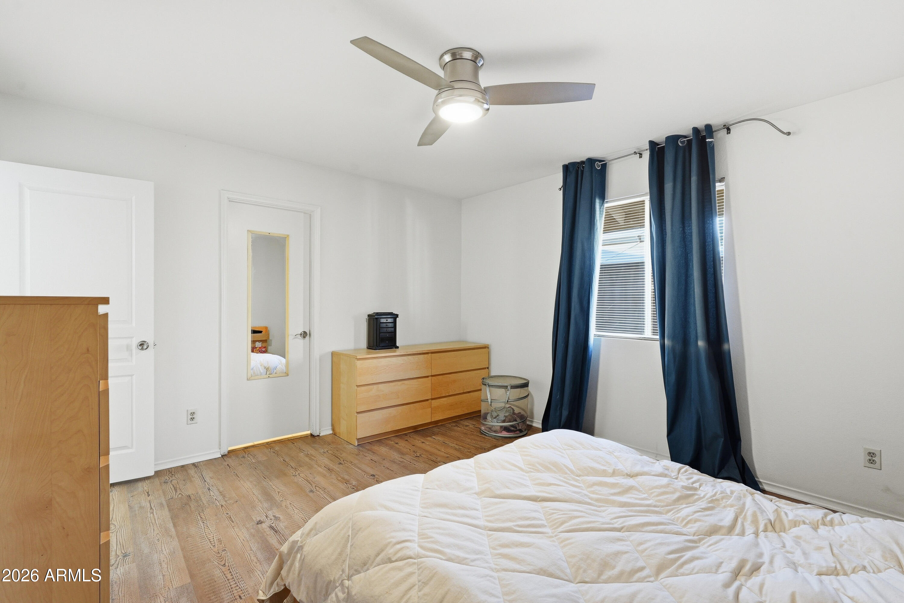 3830 East Shangri La Road Phoenix, AZ 85028 - Photo 28 of 53 a bedroom with a bed and a dresser
