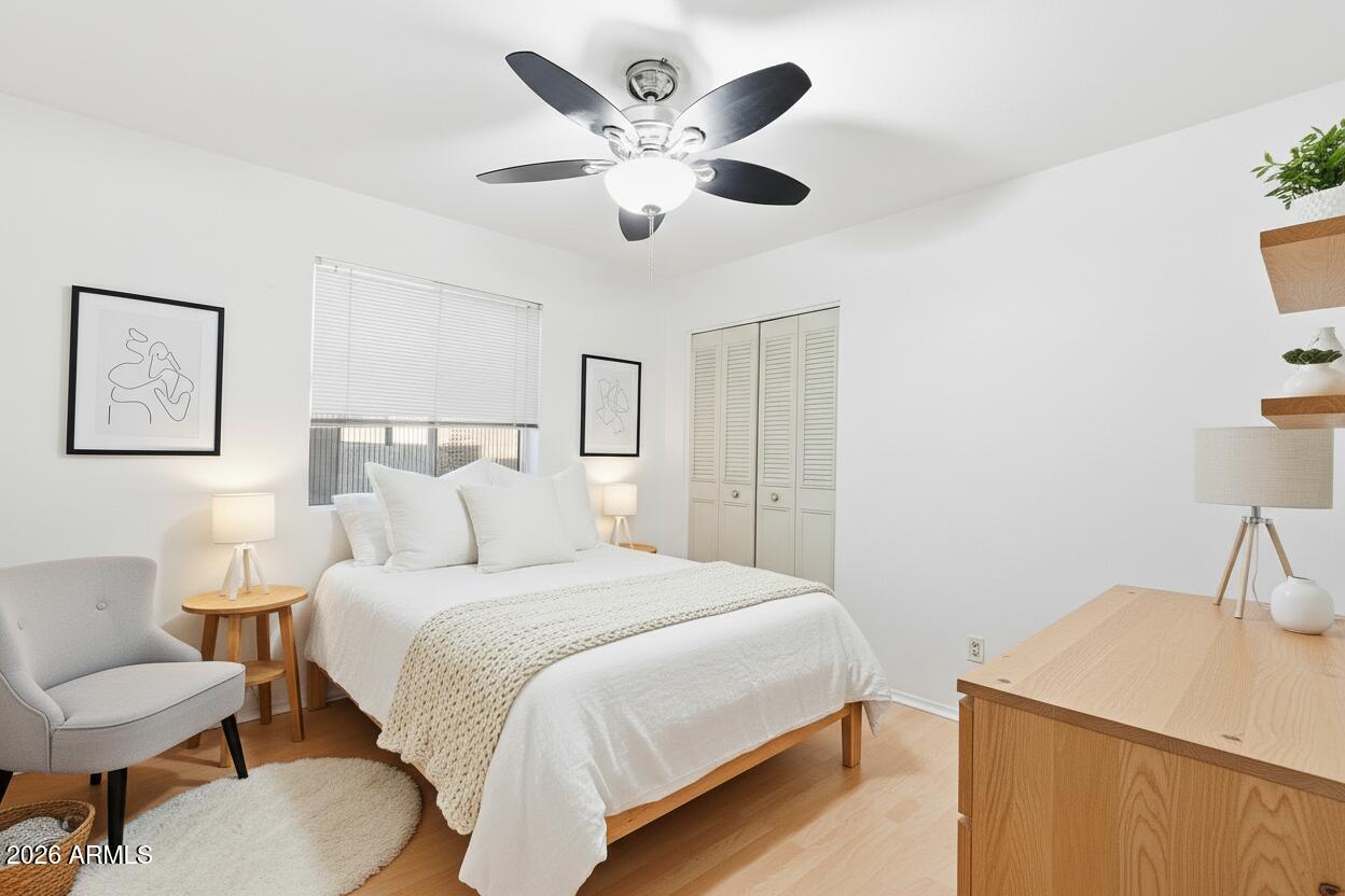 3830 East Shangri La Road Phoenix, AZ 85028 - Photo 31 of 53 a bedroom with a bed and a table