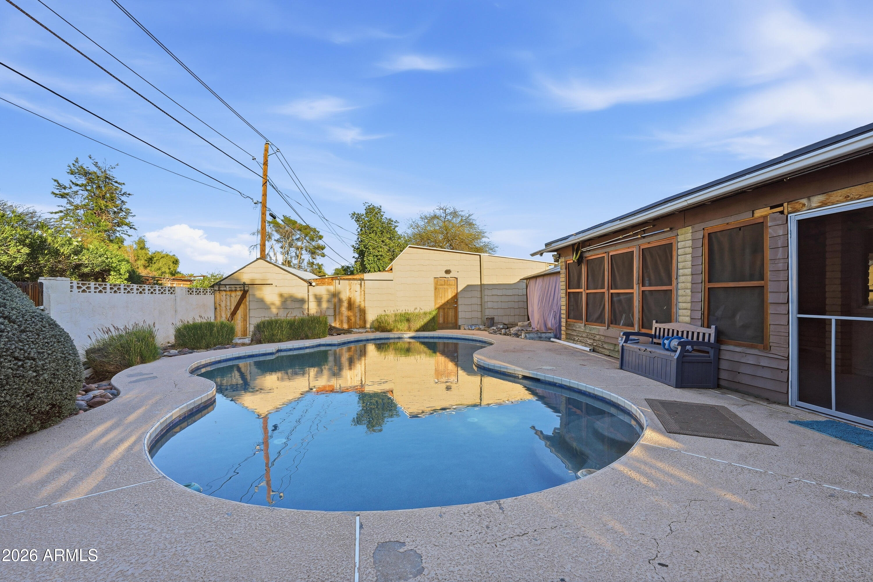 3830 East Shangri La Road Phoenix, AZ 85028 - Photo 41 of 53 a view of a swimming pool with a patio