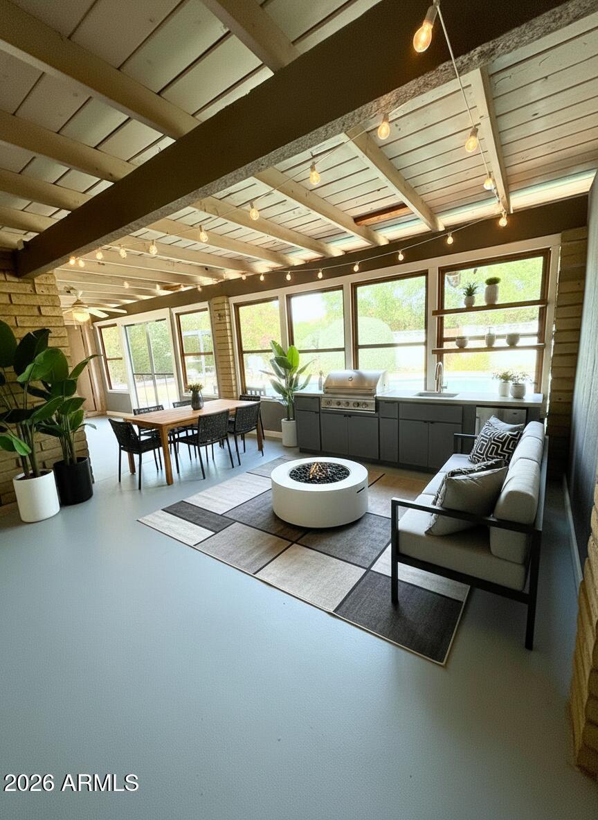 3830 East Shangri La Road Phoenix, AZ 85028 - Photo 46 of 53 a living room with furniture and a large window