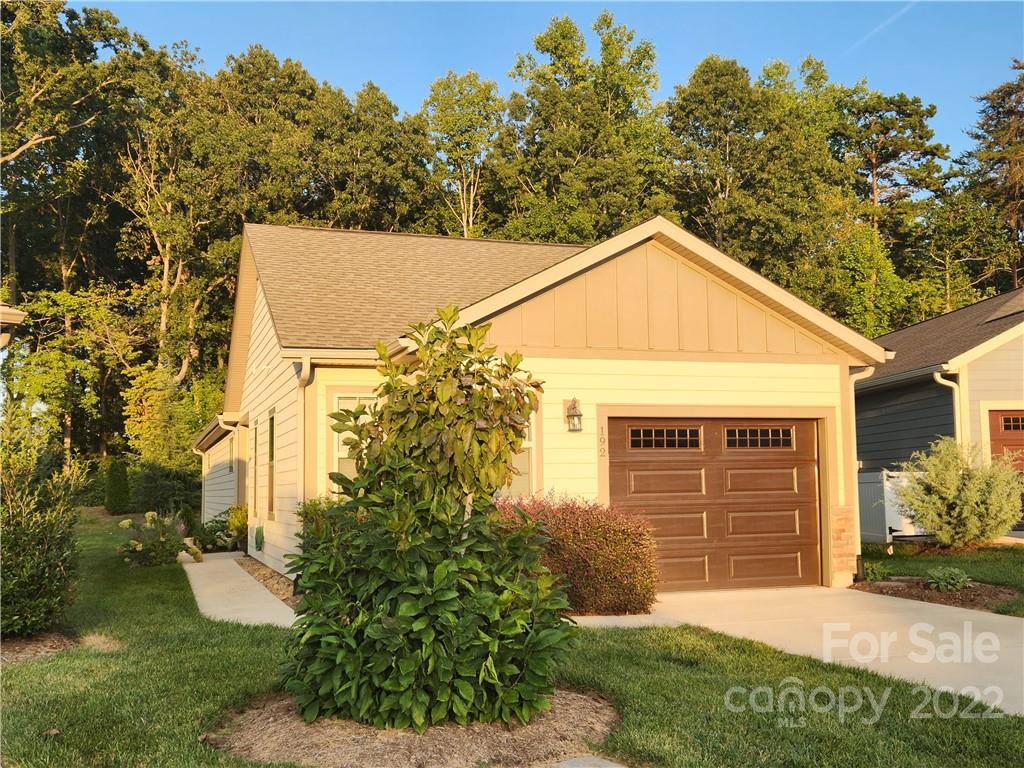 192 Flat Rock Drive Denver, NC 28037 - Photo 1 of 32 a front view of a house with a yard