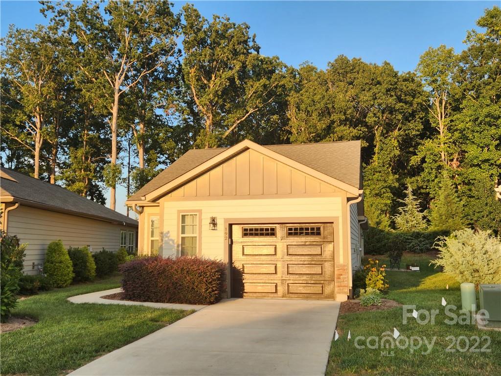 192 Flat Rock Drive Denver, NC 28037 - Photo 15 of 32 a front view of a house with a yard