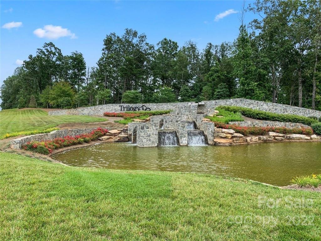 192 Flat Rock Drive Denver, NC 28037 - Photo 18 of 32 a view of a swimming pool with lounge chairs