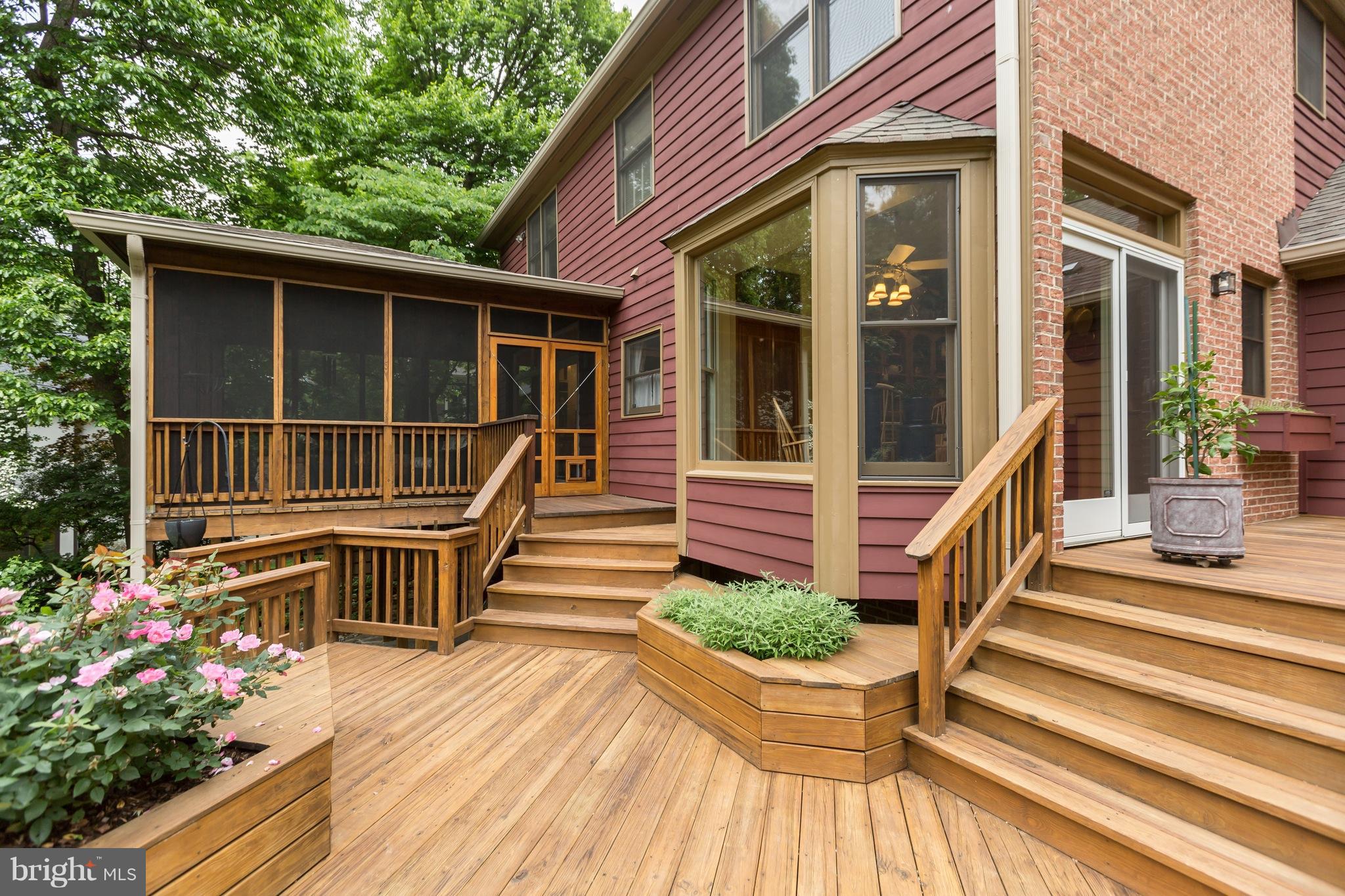 8006 Overhill Road Bethesda, MD 20814 - Photo 26 of 28 Tiered decks off of screened-in porch and kitchen