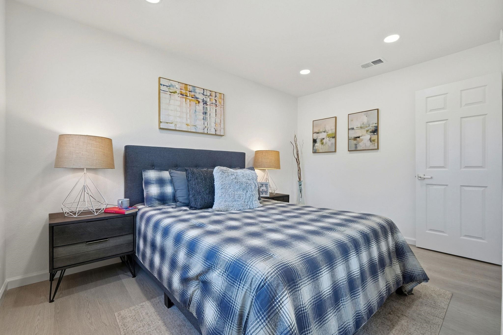 4290 Solar Circle Union City, CA 94587 - Photo 19 of 35 a bedroom with a bed and a painting on the wall