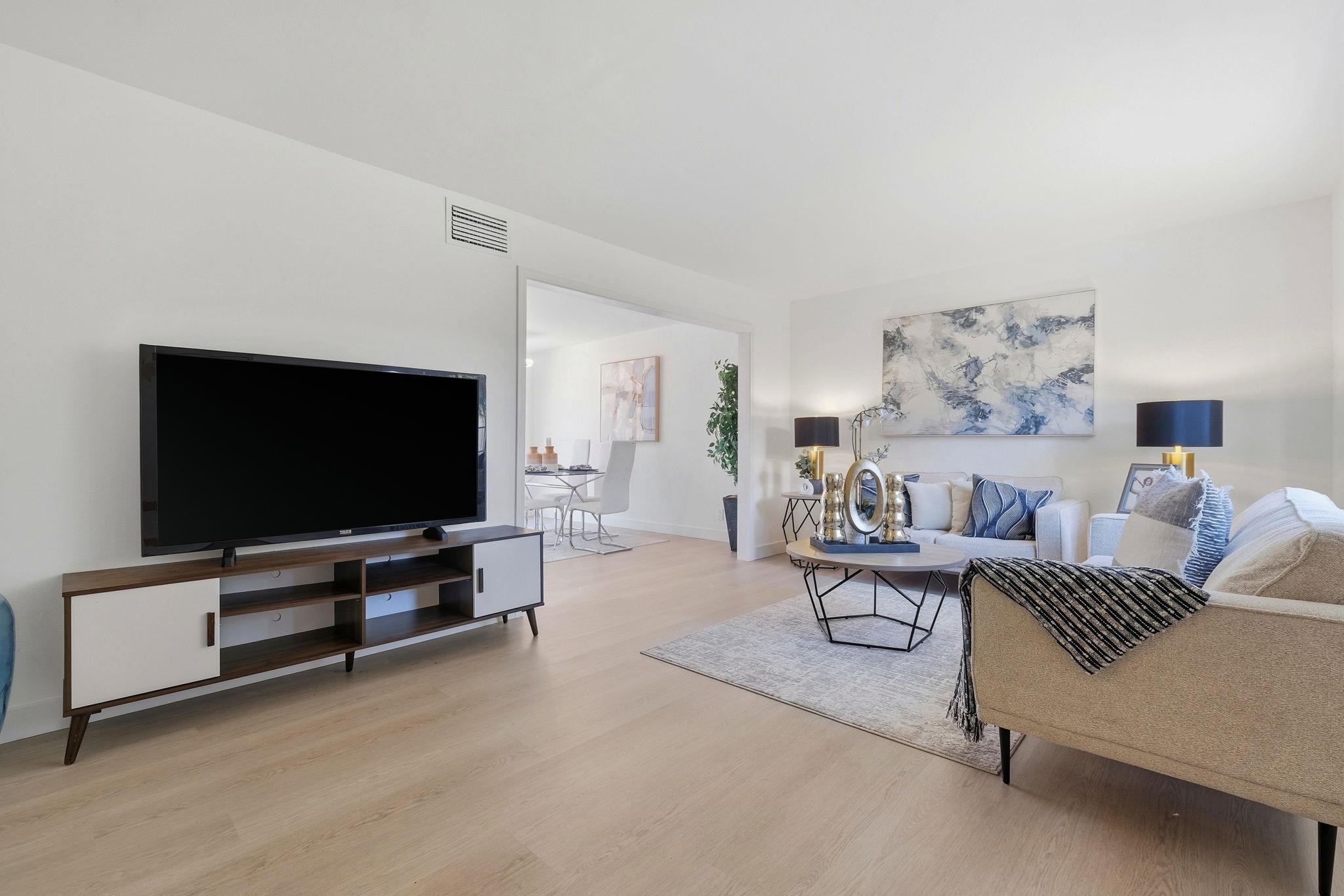 4290 Solar Circle Union City, CA 94587 - Photo 8 of 35 a living room with furniture and a flat screen tv