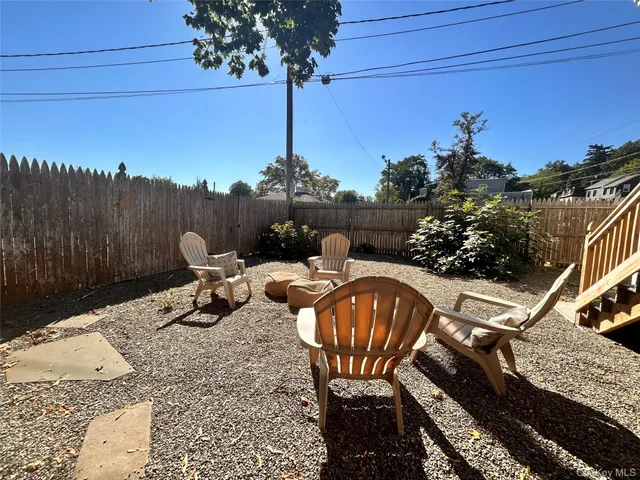 a view of a hallway with washer and dryer