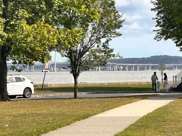 a view of a terrace with furniture and a table