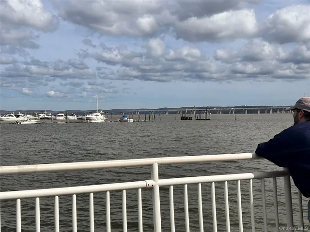 a row of car parked on the side of a road