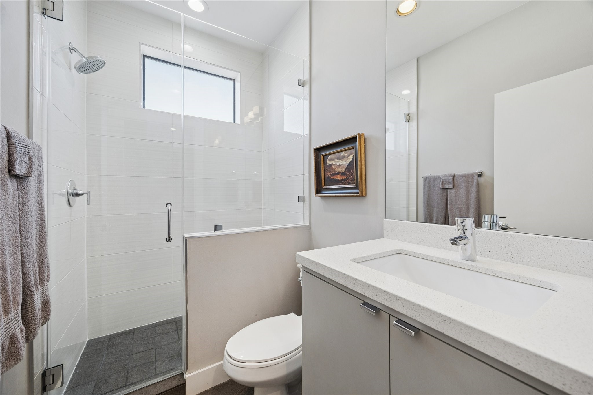 6504 Rodrigo Street, Unit B Houston, TX 77007 - Photo 23 of 29 With ensuite bath — glass shower, quartz vanity, frameless mirror.
