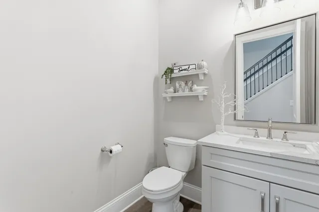 a view of workspace with furniture and wooden floor