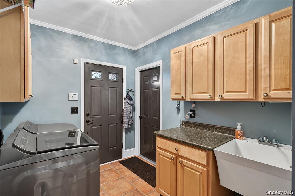73 Old Balmville Road Newburgh, NY 12550 - Photo 14 of 25 a kitchen with a refrigerator sink and cabinets