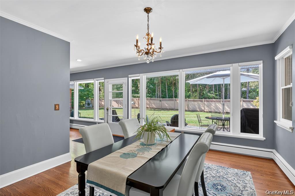 73 Old Balmville Road Newburgh, NY 12550 - Photo 8 of 25 a view of a dining room with furniture window and outside view