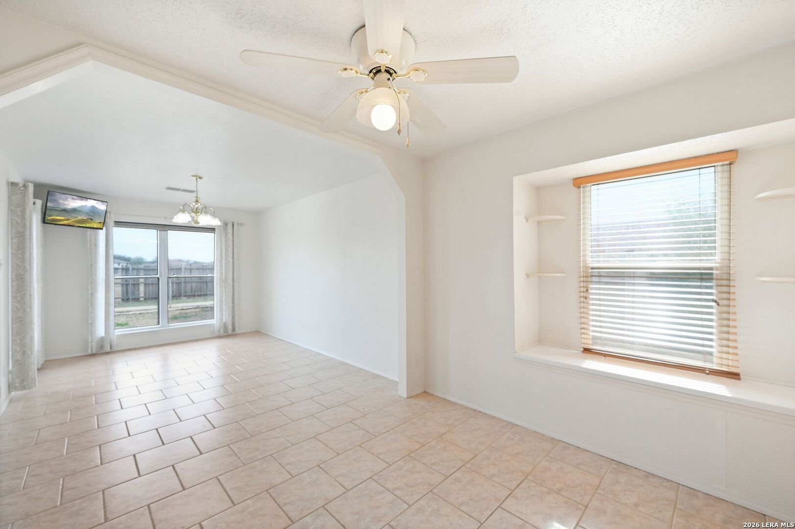 162 Oakside Universal City, TX 78148 - Photo 12 of 31 a view of an empty room with a window