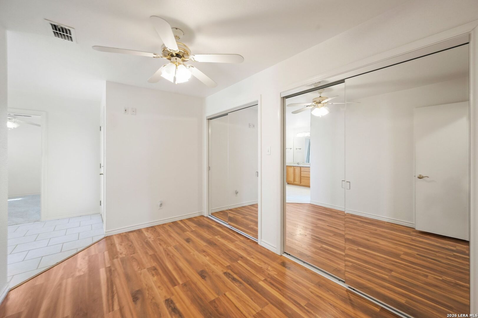 162 Oakside Universal City, TX 78148 - Photo 16 of 31 a view of an empty room with wooden floor
