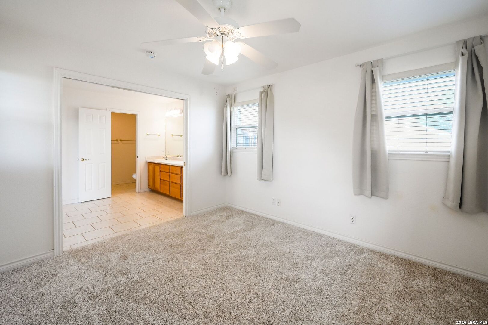 162 Oakside Universal City, TX 78148 - Photo 21 of 31 wooden floor in an empty room with a window