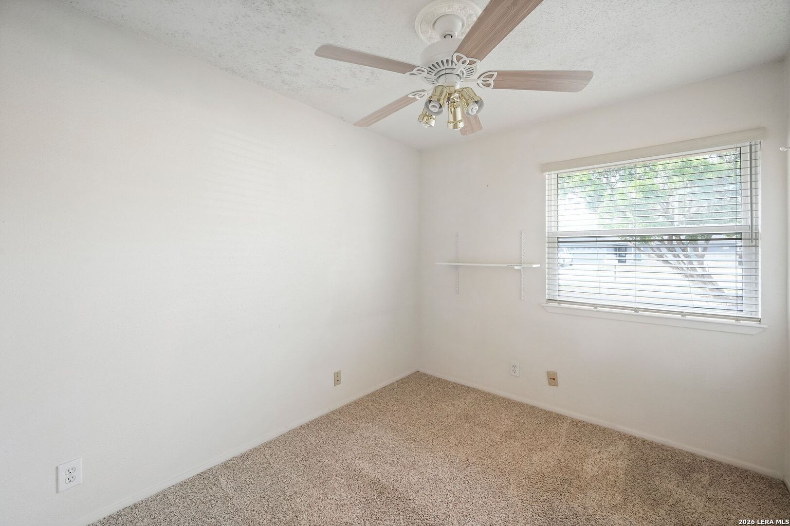 162 Oakside Universal City, TX 78148 - Photo 24 of 31 an empty room with a window