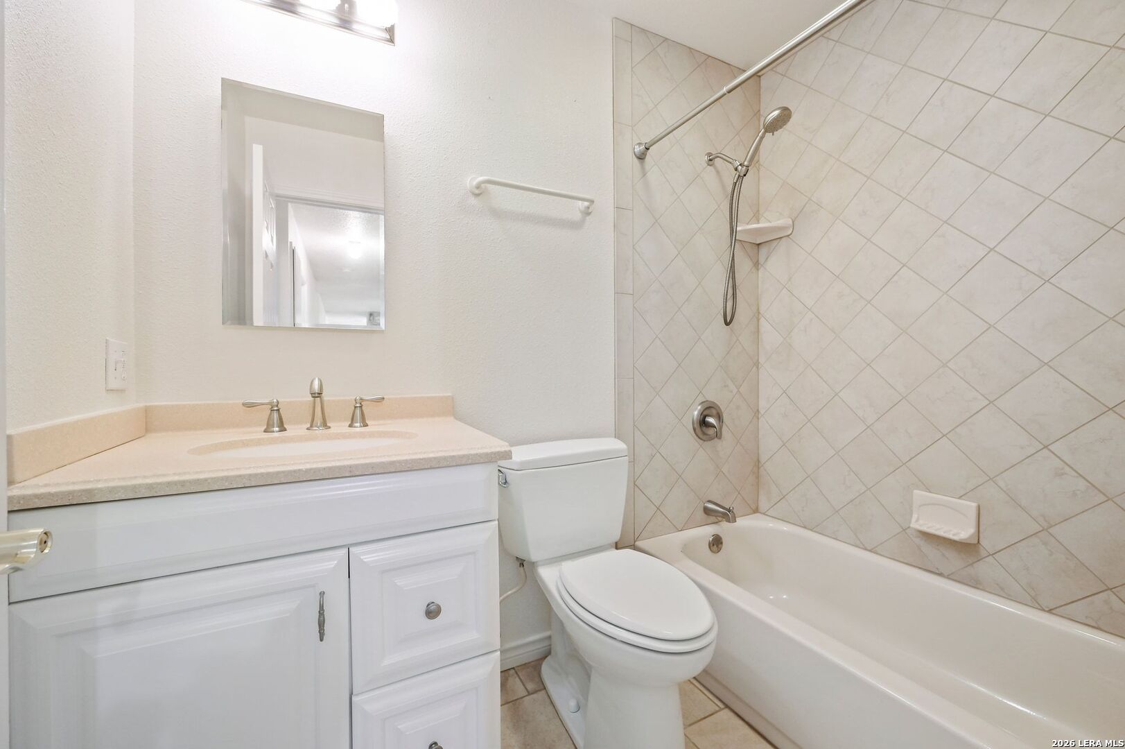 162 Oakside Universal City, TX 78148 - Photo 25 of 31 a bathroom with a granite countertop sink toilet and shower