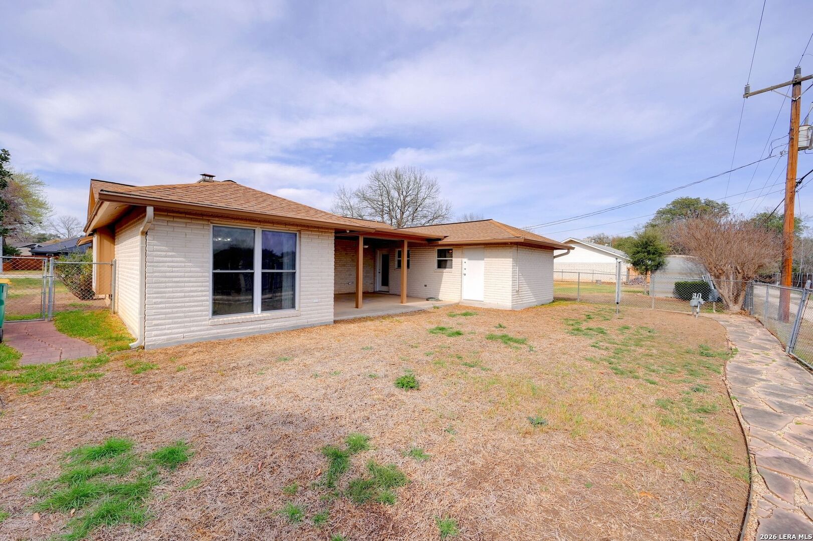 162 Oakside Universal City, TX 78148 - Photo 29 of 31 a front view of a house with a yard and garage