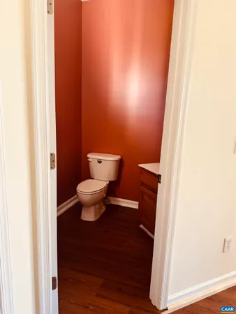 a bathroom with a toilet and a sink