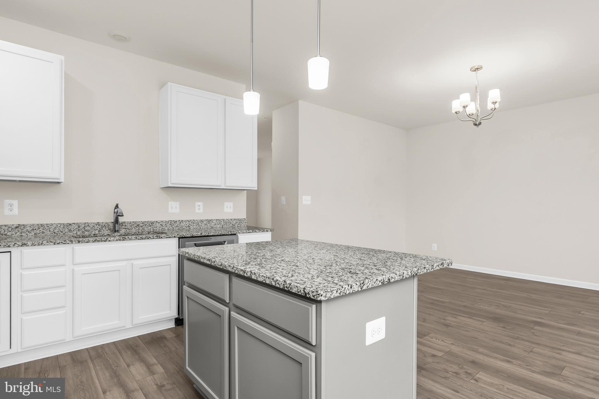 319 Appleby School Road Cambridge, MD 21613 - Photo 13 of 29 a kitchen that has a sink and a stove in it