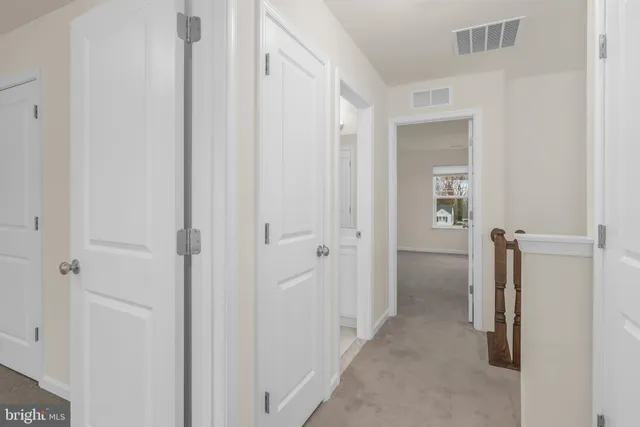 a view of a room with a wardrobe space