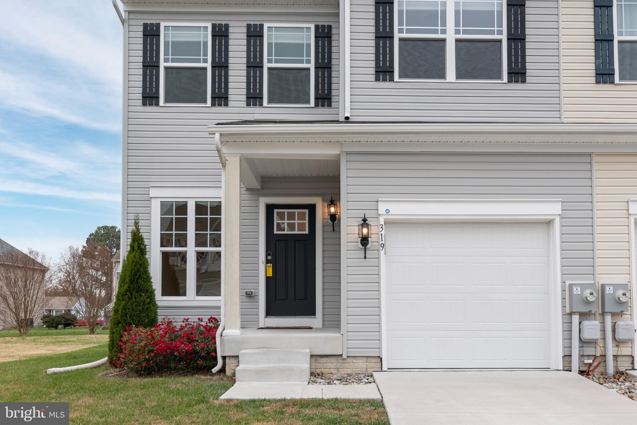 319 Appleby School Road Cambridge, MD 21613 - Photo 2 of 29 front view of a house with a yard