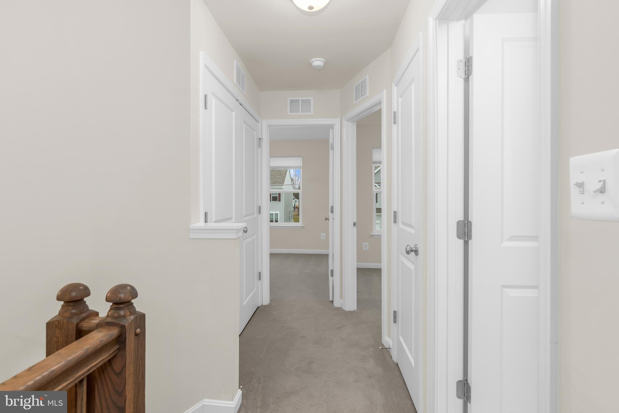 319 Appleby School Road Cambridge, MD 21613 - Photo 22 of 29 a view of a hallway with closet and a shower