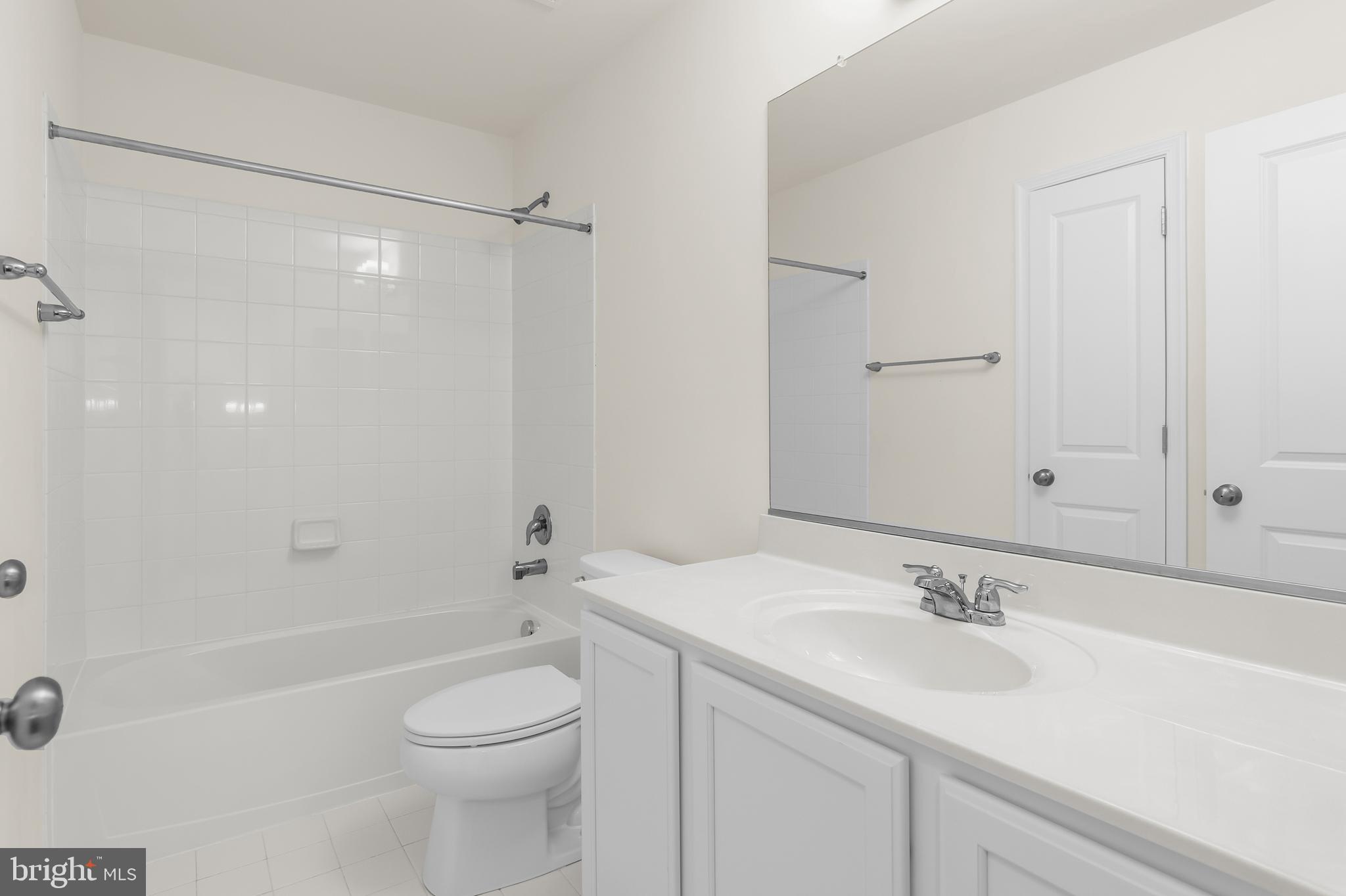 319 Appleby School Road Cambridge, MD 21613 - Photo 24 of 29 a bathroom with a sink toilet and shower