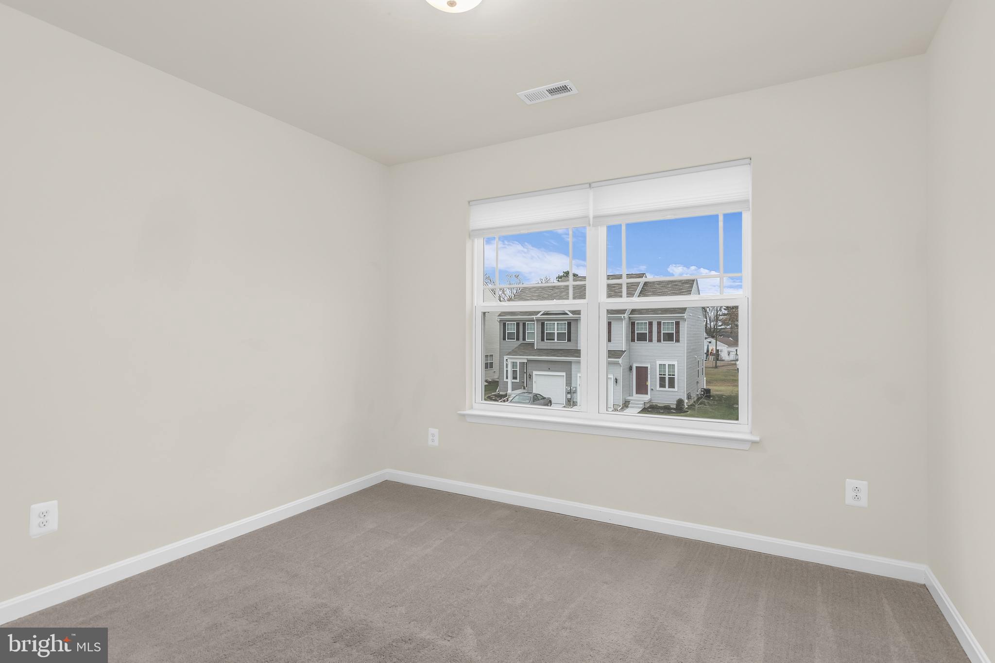 319 Appleby School Road Cambridge, MD 21613 - Photo 25 of 29 a view of an empty room with a window