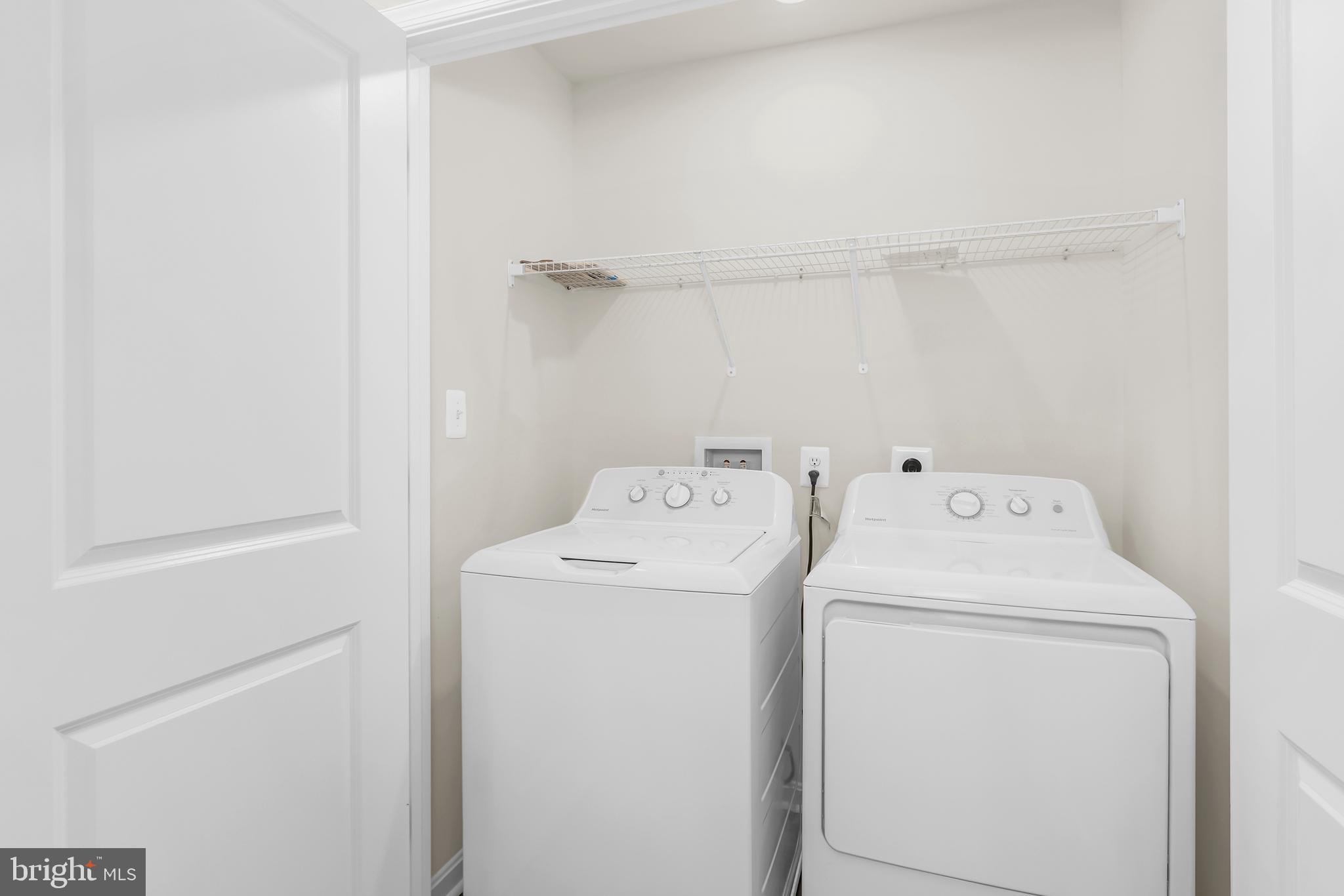 319 Appleby School Road Cambridge, MD 21613 - Photo 27 of 29 a view of storage and utility room with washer and dryer