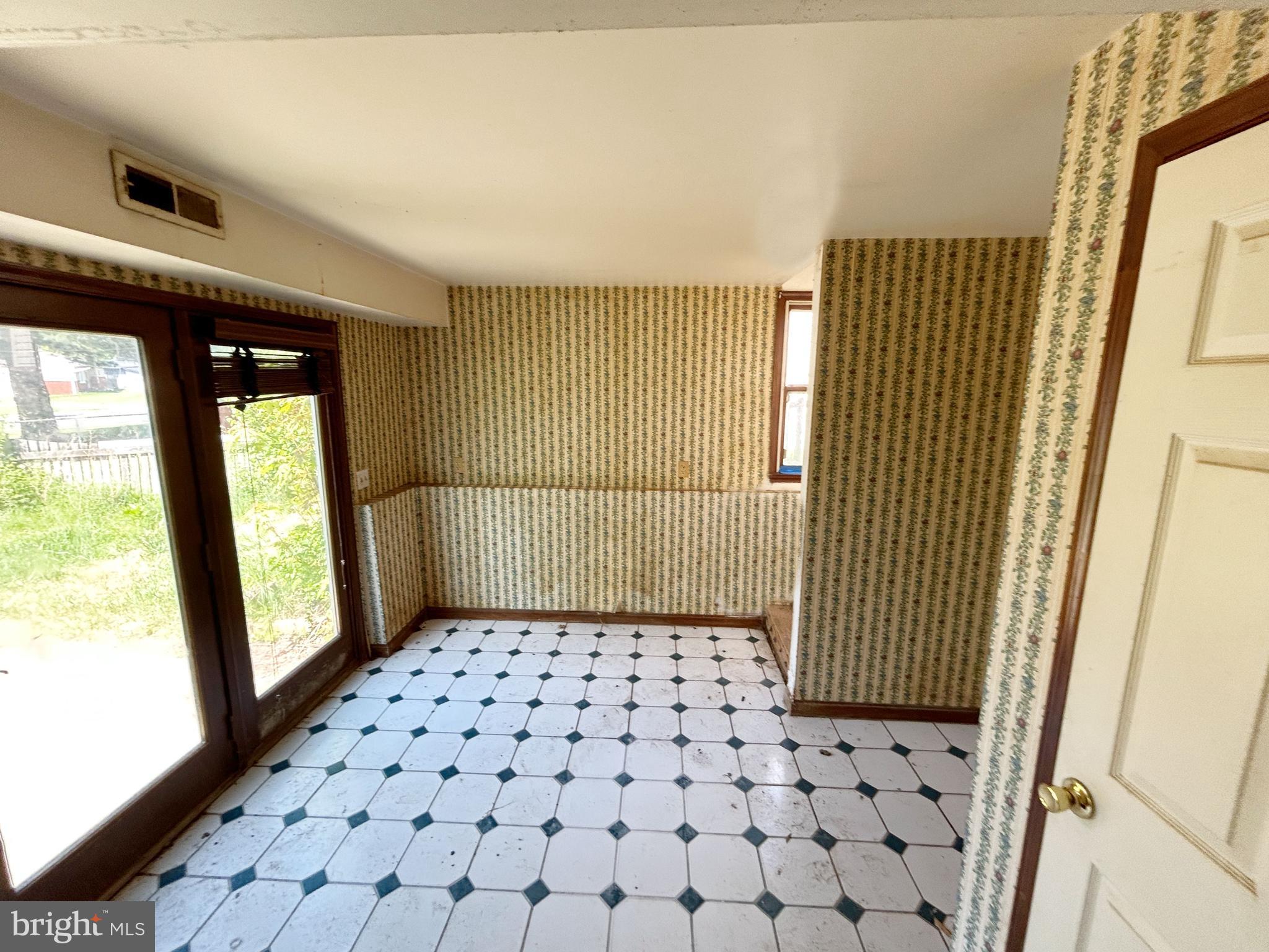 311 Ferndale Road Glen Burnie, MD 21061 - Photo 17 of 21 a bathroom with a glass door shower and a sink