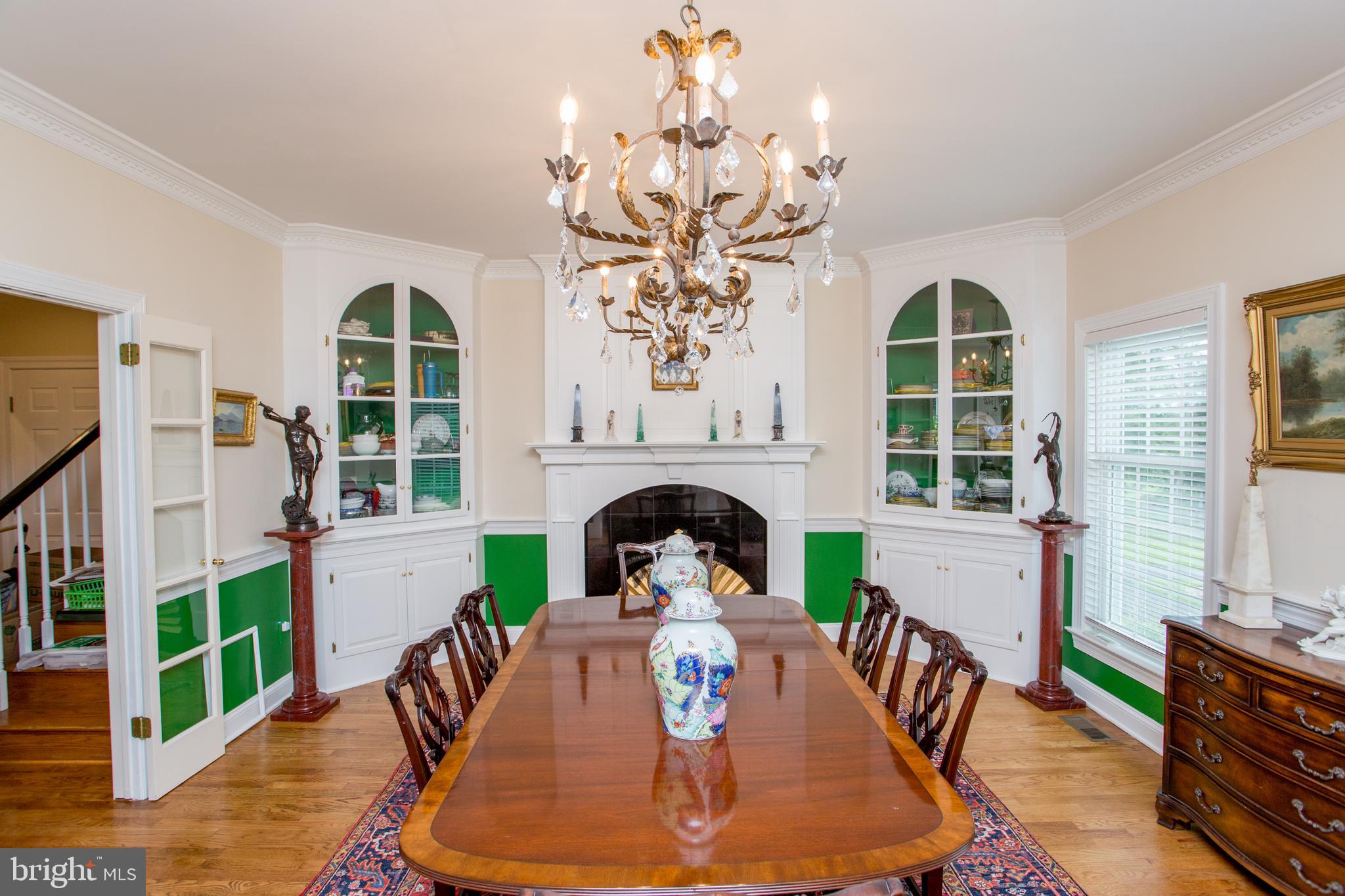 5584 Lower Mountain Road New Hope, PA 18938 - Photo 13 of 58 a view of a dining room with furniture a chandelier and wooden floor