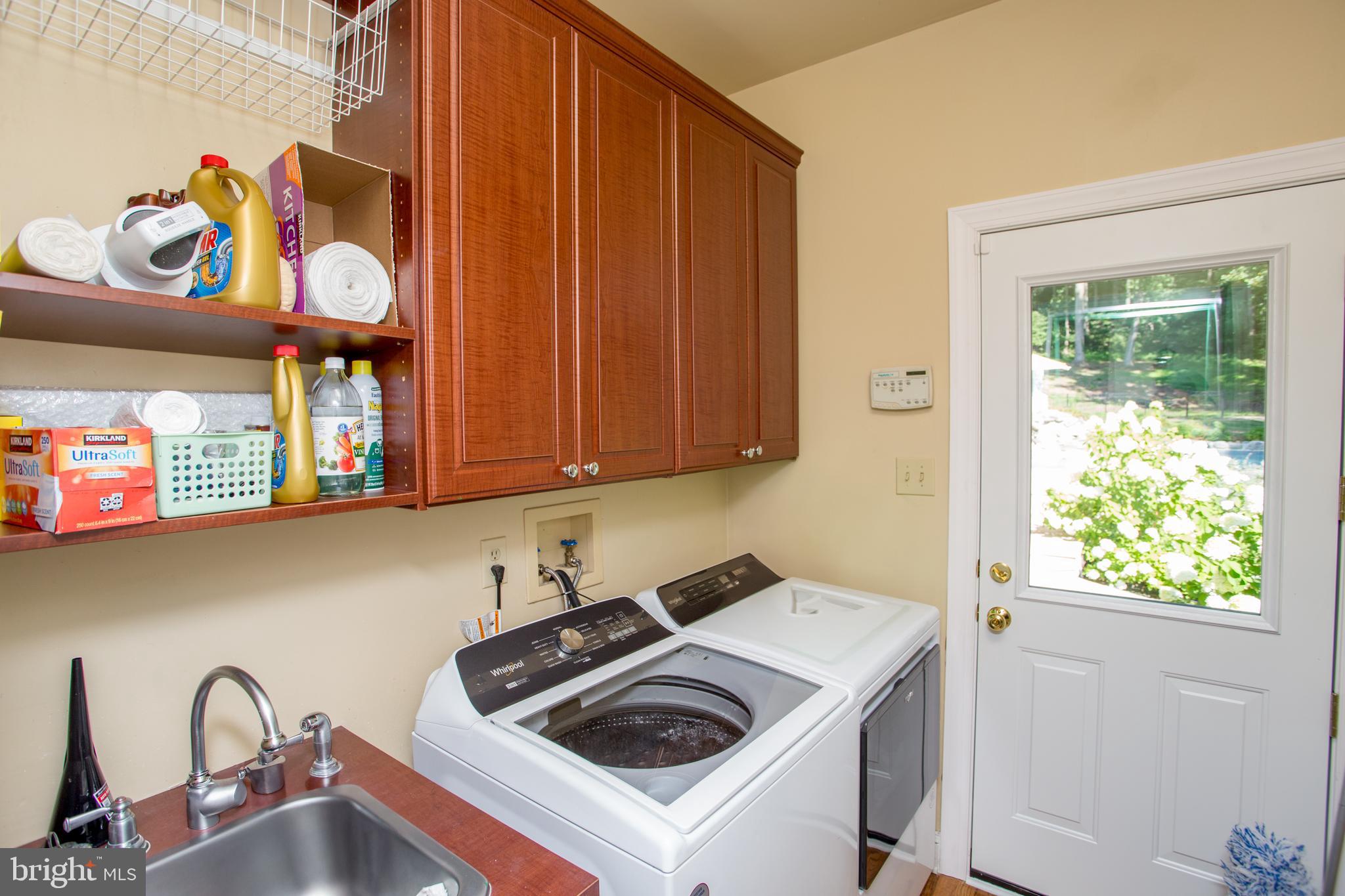 5584 Lower Mountain Road New Hope, PA 18938 - Photo 20 of 58 a kitchen with sink cabinets and window