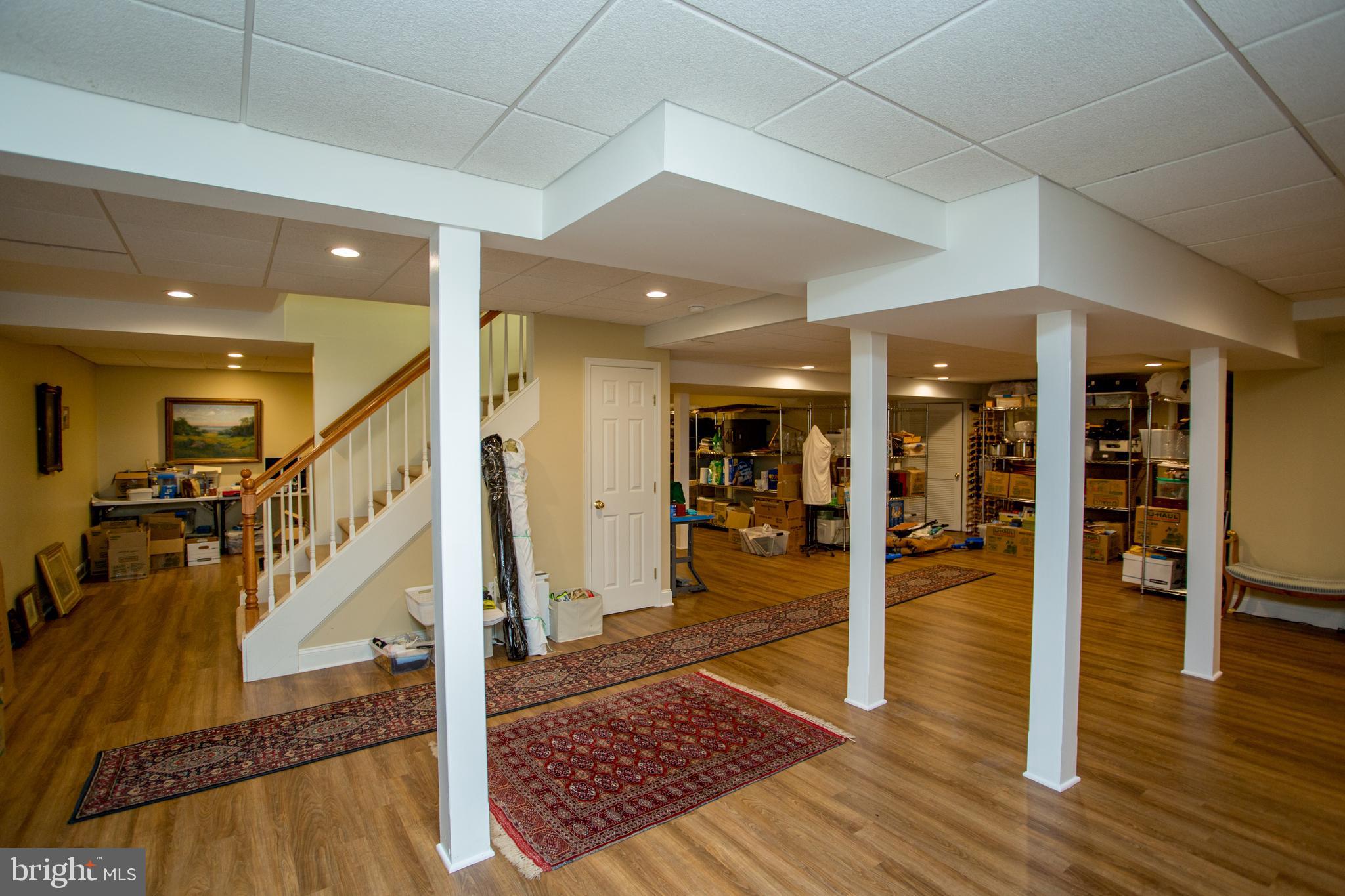 5584 Lower Mountain Road New Hope, PA 18938 - Photo 38 of 58 a view of a hallway with wooden floor and staircase