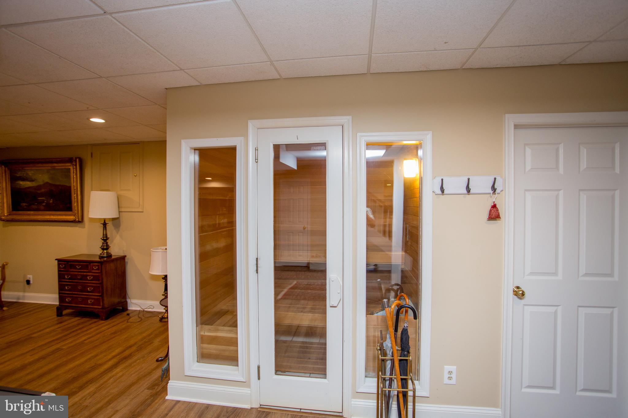 5584 Lower Mountain Road New Hope, PA 18938 - Photo 40 of 58 a view of a hallway with wooden floor and staircase
