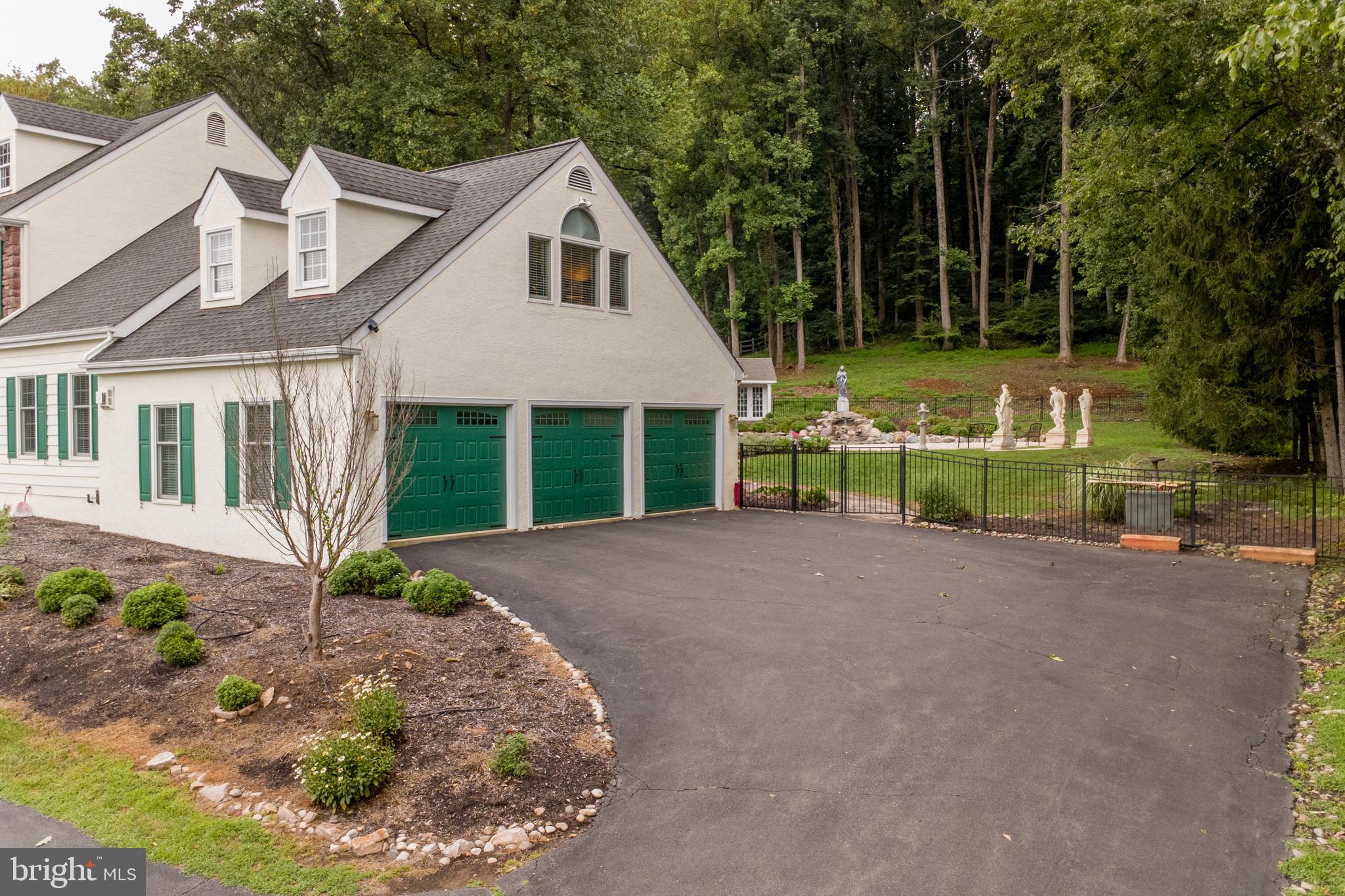 5584 Lower Mountain Road New Hope, PA 18938 - Photo 44 of 58 a view of a house with a garden and pathway
