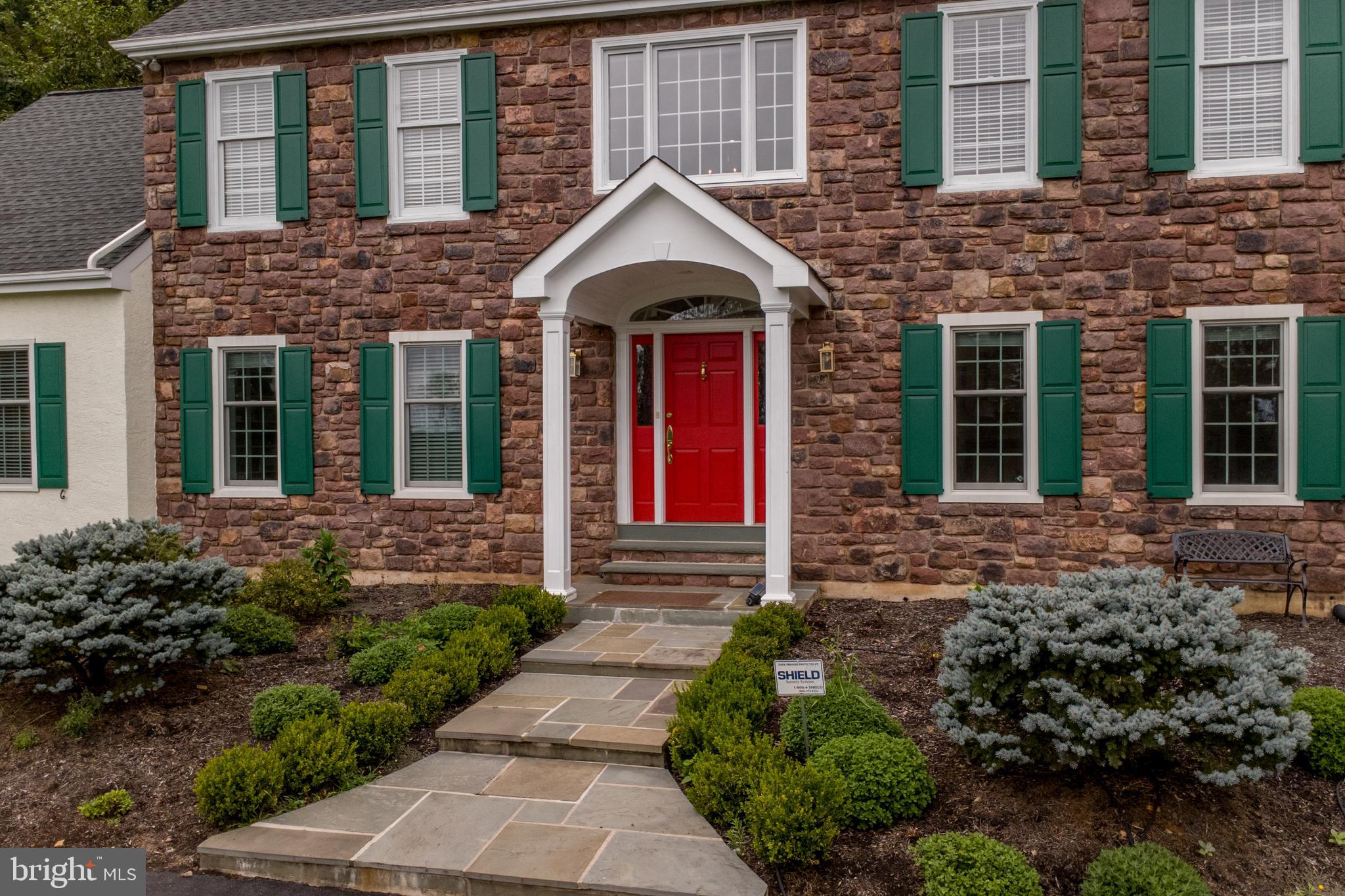 5584 Lower Mountain Road New Hope, PA 18938 - Photo 54 of 58 a front view of a house with garden