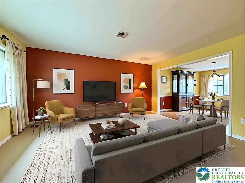 2507 Rachael Lane Orefield, PA 18069 - Photo 11 of 53 a living room with furniture and a flat screen tv