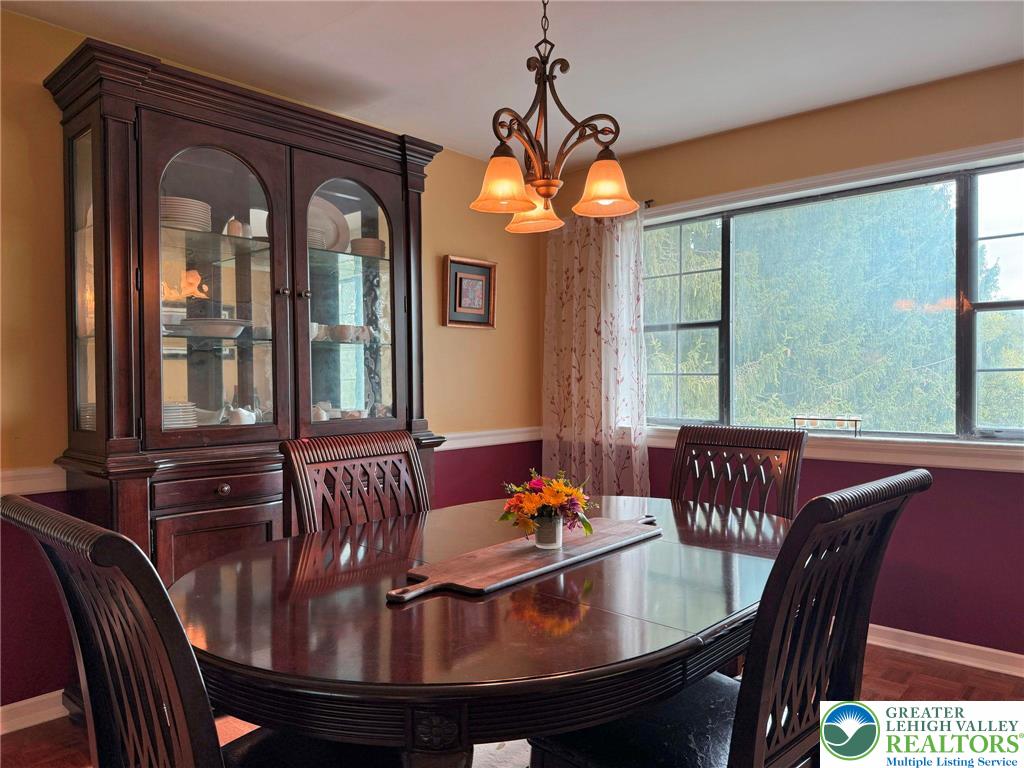 2507 Rachael Lane Orefield, PA 18069 - Photo 14 of 53 a view of a dining room with furniture chandelier and a chandelier